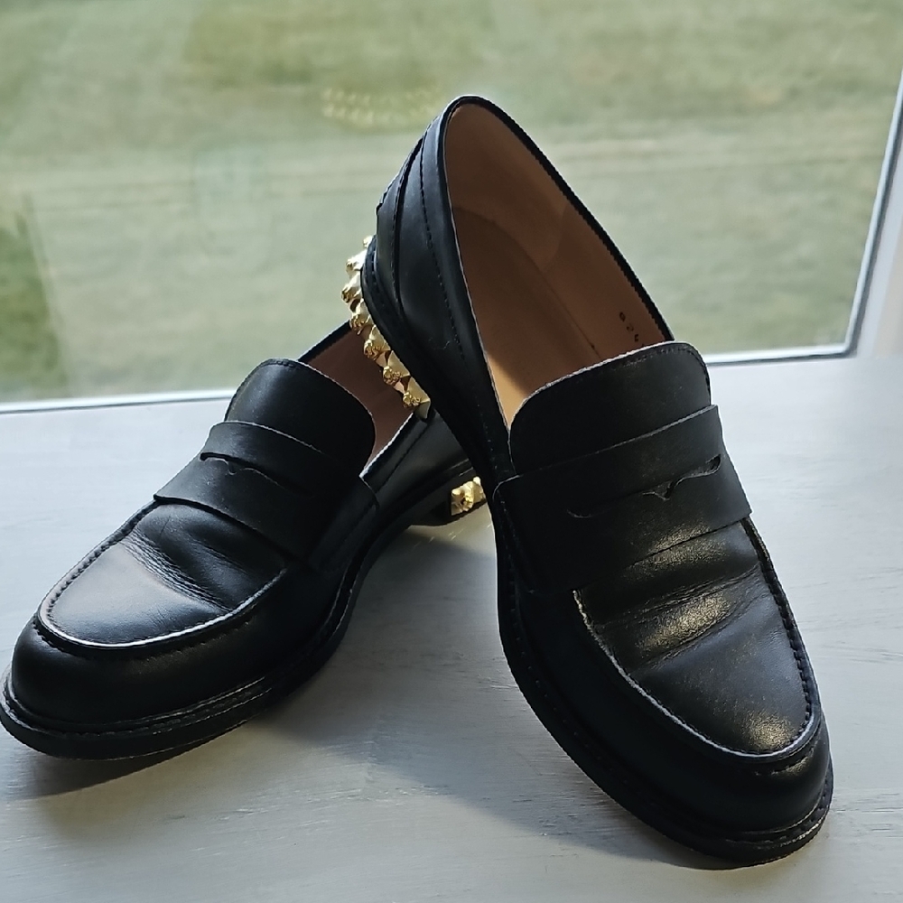 Stuart Weitzman Black Loafers with Gold Accents